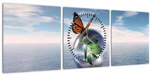 Obraz motýľa na sklenenej guli (s hodinami) (90x30 cm)