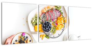 Obraz tanierov s ovocím na stole (s hodinami) (90x30 cm)