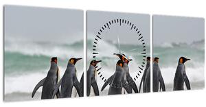 Obraz tučniakov pri oceáne (s hodinami) (90x30 cm)
