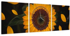 Obraz - Slnečnice a lístky kvetov (s hodinami) (90x30 cm)