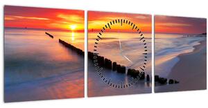 Obraz - Západ slnka, Baltské more, Poľsko (s hodinami) (90x30 cm)