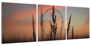 Obraz - Silueta rastliny (s hodinami) (90x30 cm)