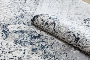 Moderný koberec REBEC 51122A strapce, krémovo/ tmavo modrý