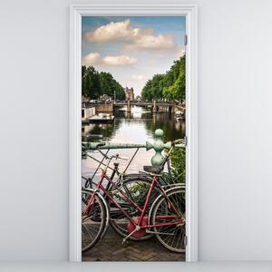Fototapeta na dvere - Kolesá v meste (95x205cm)
