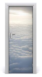 Fototapeta na dvere let nad oblaky 95x205 cm