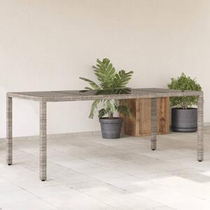 Záhradný stôl so sklenenou doskou sivý 190x90x75 cm polyratan