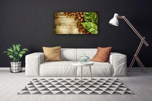 Obraz na plátne Zrnká káva listy kuchyňa 100x50 cm