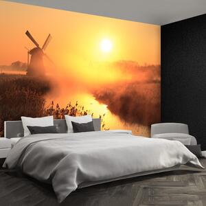 Fototapeta Vliesová Slnko veterný mlyn 104x70 cm