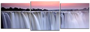 Obraz na plátne - Vodopád sfarbený západom slnka - panoráma 5227D (150x50 cm)