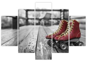 Obraz červených starých kolieskových topánok (150x105 cm)