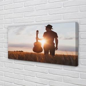 Obraz canvas gitara muž 100x50 cm