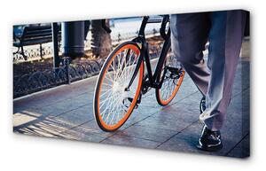 Obraz canvas Mesto na bicykli noha 100x50 cm
