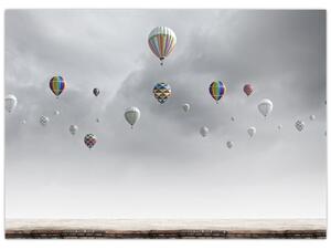 Obraz - Balóny nad tehlovou stenou (70x50 cm)