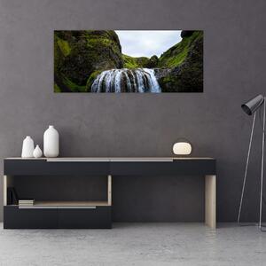Obraz útesu s vodopádom (120x50 cm)