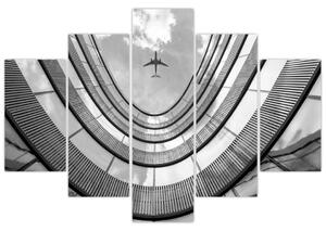 Obraz - Lietadlo nad budovou (150x105 cm)