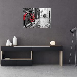 Obraz červeného kolesa na dláždenej ulici (70x50 cm)