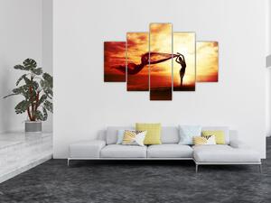 Obraz - Silueta ženy v západu slnka (150x105 cm)