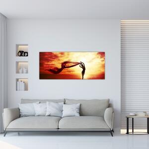 Obraz - Silueta ženy v západu slnka (120x50 cm)