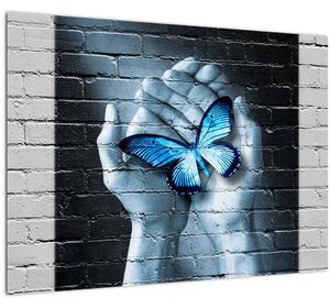Sklenený obraz modrého motýľa na stene (70x50 cm)