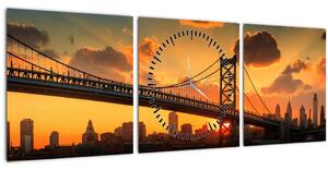 Obraz - Západ slnka nad mostom Bena Franklina, Filadelfia (s hodinami) (90x30 cm)