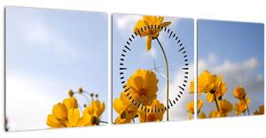 Obraz poľa s jasne žltými kvetmi (s hodinami) (90x30 cm)