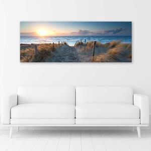 Obraz na plátne Západ slnka na pláži pri mori Rozmery: 90 x 30 cm