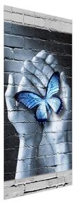 Fototapeta na dvere - Modrý motýľ v dlaniach (95x205cm)