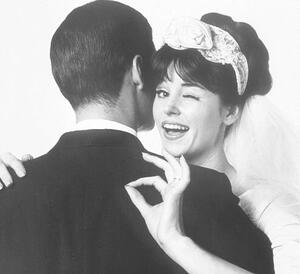 Umelecká fotografie BRIDE HUGGING HUSBAND, OKAY GESTURE, 1963, Archive Holdings Inc., (30 x 40 cm)