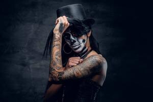 Fotografia A woman with painted skull face., FXQuadro