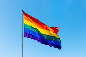 Umelecká fotografie Rainbow LGBTQI flag waving in the wind, Alexander Spatari, (40 x 26.7 cm)