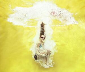 Umelecká fotografie Girl jumping into water on yellow background, Stanislaw Pytel, (40 x 35 cm)