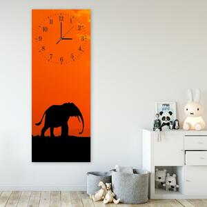Hodiny na stenu Putovanie slona Rozmery: 25 x 65 cm
