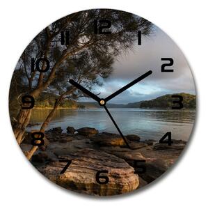 Sklenené nástenné hodiny okrúhle Strom nad riekou
