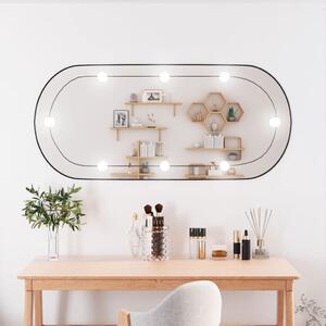Nástenné zrkadlo s LED svetlami 45x100 cm sklo oválne