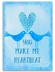 Obraz na plátne Dvaja vtáci na modrom pozadí s nápisom You Make Me Heartbeat - Andrea Haase Rozmery: 40 x 60 cm