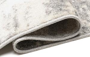 Krémový dizajnový koberec so sivým abstraktným vzorom Šírka: 80 cm | Dĺžka: 150 cm