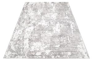 Dizajnový koberec s abstraktným vzorom v krémovej farbe krémová Šírka: 80 cm | Dĺžka: 150 cm