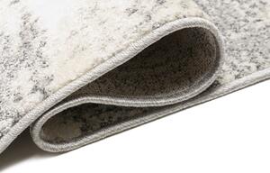 Krémový dizajnový koberec so svetlým sivým vzorom krémová Šírka: 80 cm | Dĺžka: 150 cm