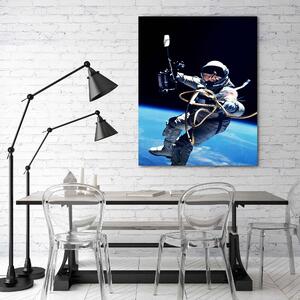Obraz na plátne Astronaut nad zemou - Nikita Abakumov Rozmery: 40 x 60 cm