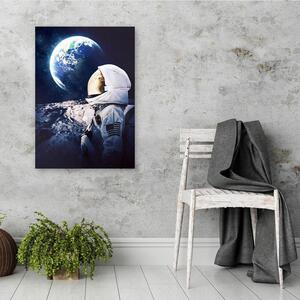Obraz na plátne Astronaut sa pozerá na Zem z vesmíru - Gab Fernando Rozmery: 40 x 60 cm