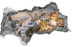 Foto fotografie diera na stenu Santorini, grécko