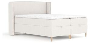 Krémová boxspring posteľ s úložným priestorom 180x200 cm Monpelli – Maison de Rêve