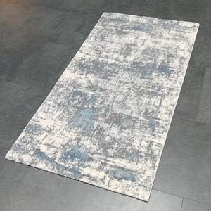 Abstraktný koberec Paríž v modrej farbe - Pierre Cardin - XS