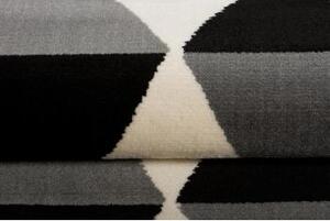 Moderný sivo-biely koberec so vzorom