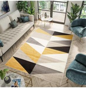 Moderný koberec s trojuholníkovým vzorom