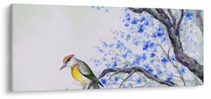 Obraz - Vtáčik na strome s modrými kvetmi (120x50 cm)