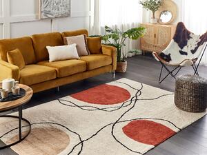 Bavlnený koberec béžový a červený 140 x 200 cm abstraktný vzor strapce nízky vlas moderný dizajn