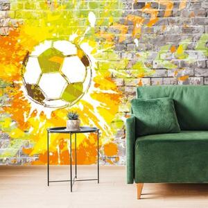 Tapeta futbalová lopta na tehlovej stene - 225x150