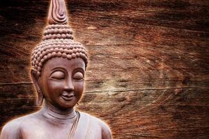 Samolepiaca tapeta socha Budhu na drevenom pozadí - 375x250
