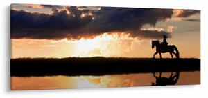 Obraz - Jazdec na koni pri západe slnka (120x50 cm)